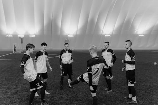 youth soccer players practicing