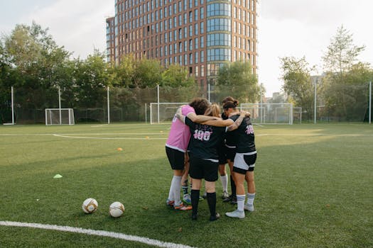 team huddling during a soccer game