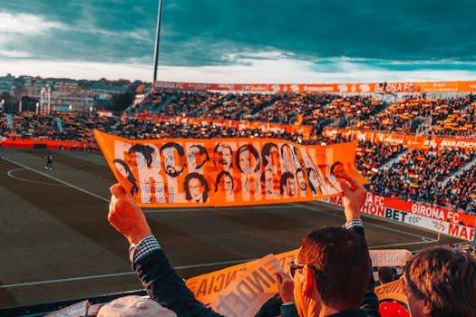 Exciting soccer match with fans cheering