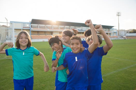 soccer players celebrating a goal