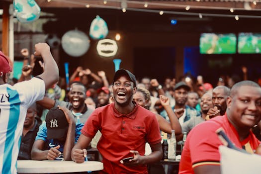 group of fans watching a match together