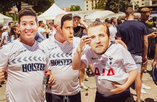 Fans celebrating at a local soccer event