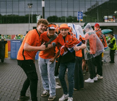 Fans celebrating together in a stadium