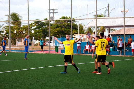 A soccer player celebrating a last-minute goal